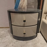 High-Gloss Round Nightstand with Grey Diagonal Pattern and Curved Cream Drawers